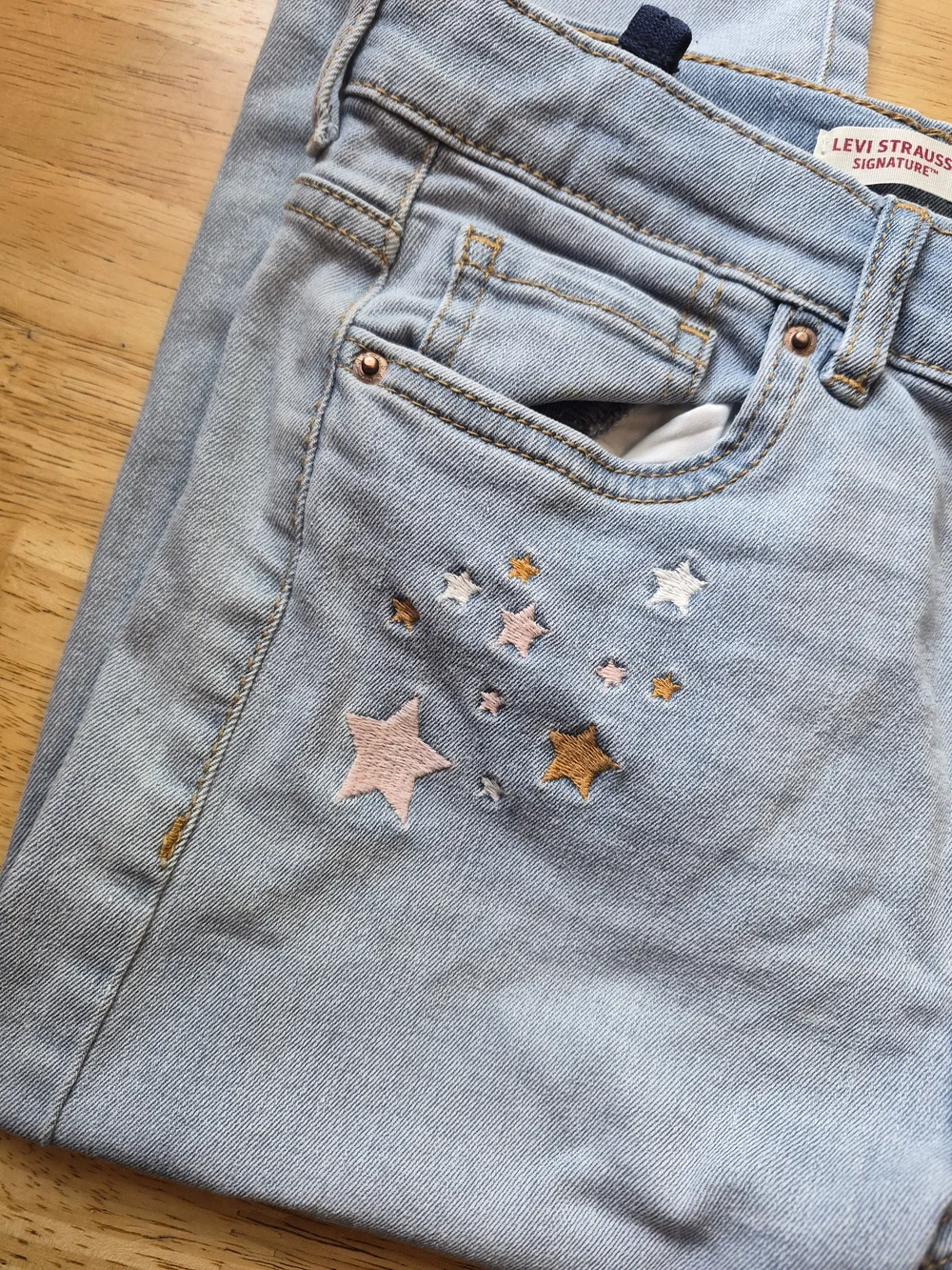 Levi's Light Wash High-Rise Jeans with Star Embroidery